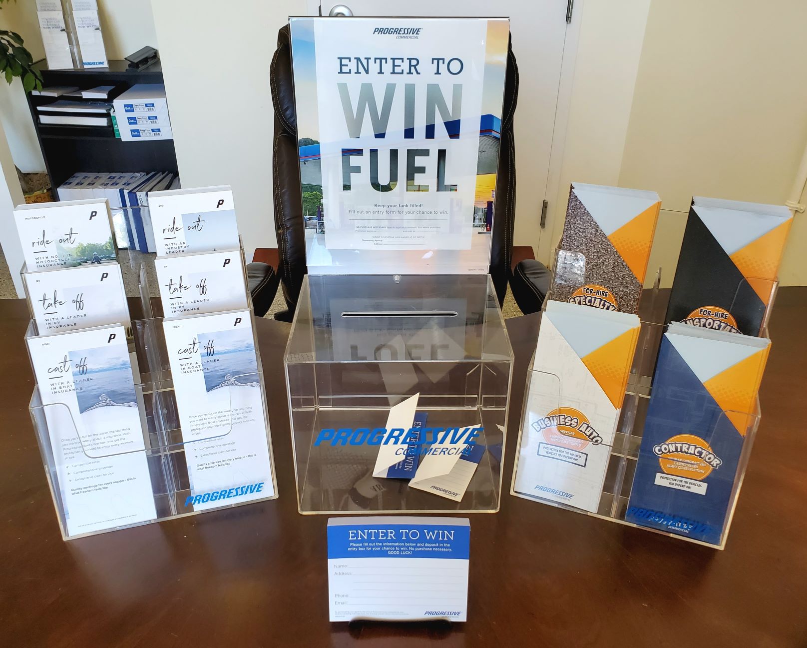 a stack of flyers on a table